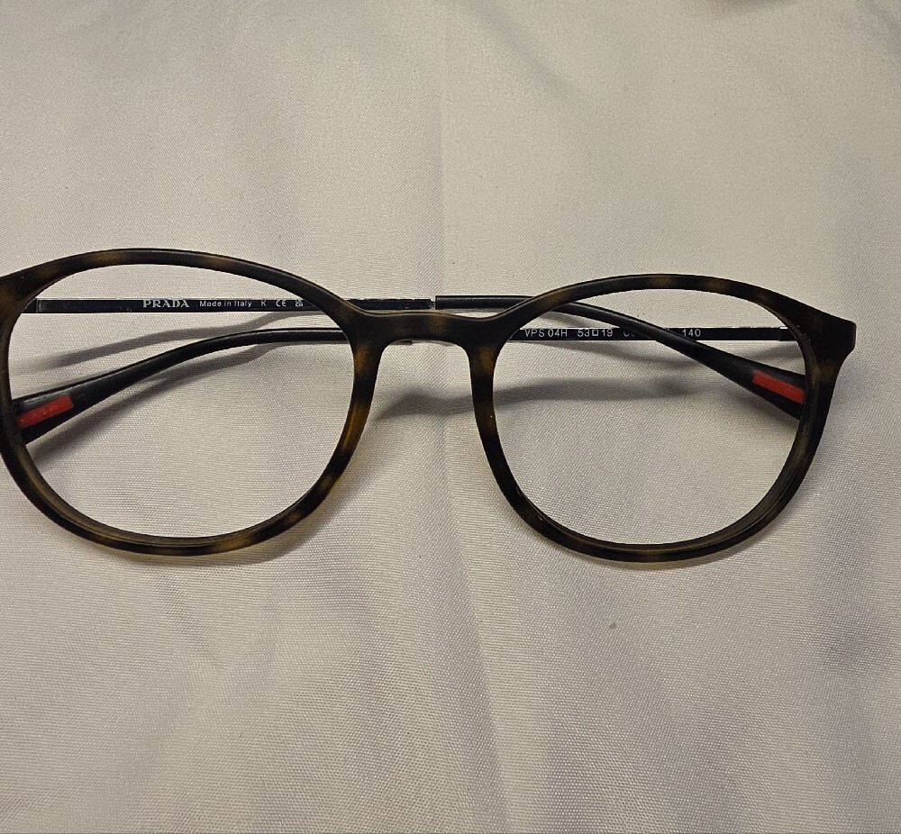 Prada Round Tortoiseshell Optical Glasses with Black Metal Bridge